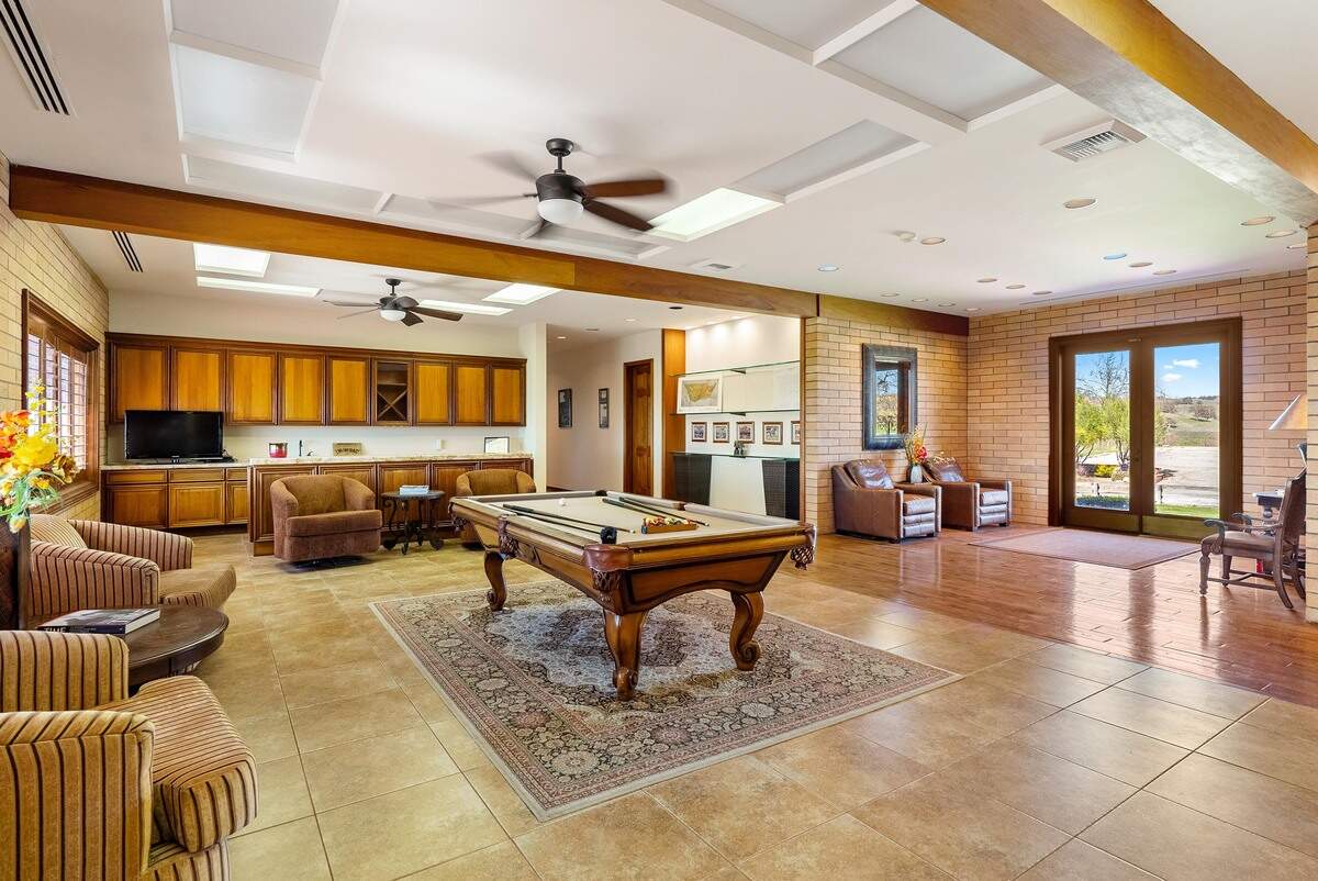 This 3,900 square foot house sits on Windfall Farms in Paso Robles, which recently went on the market for $33 million in July 2026. The 700-plus acre property also have a vineyard and equestrian park.